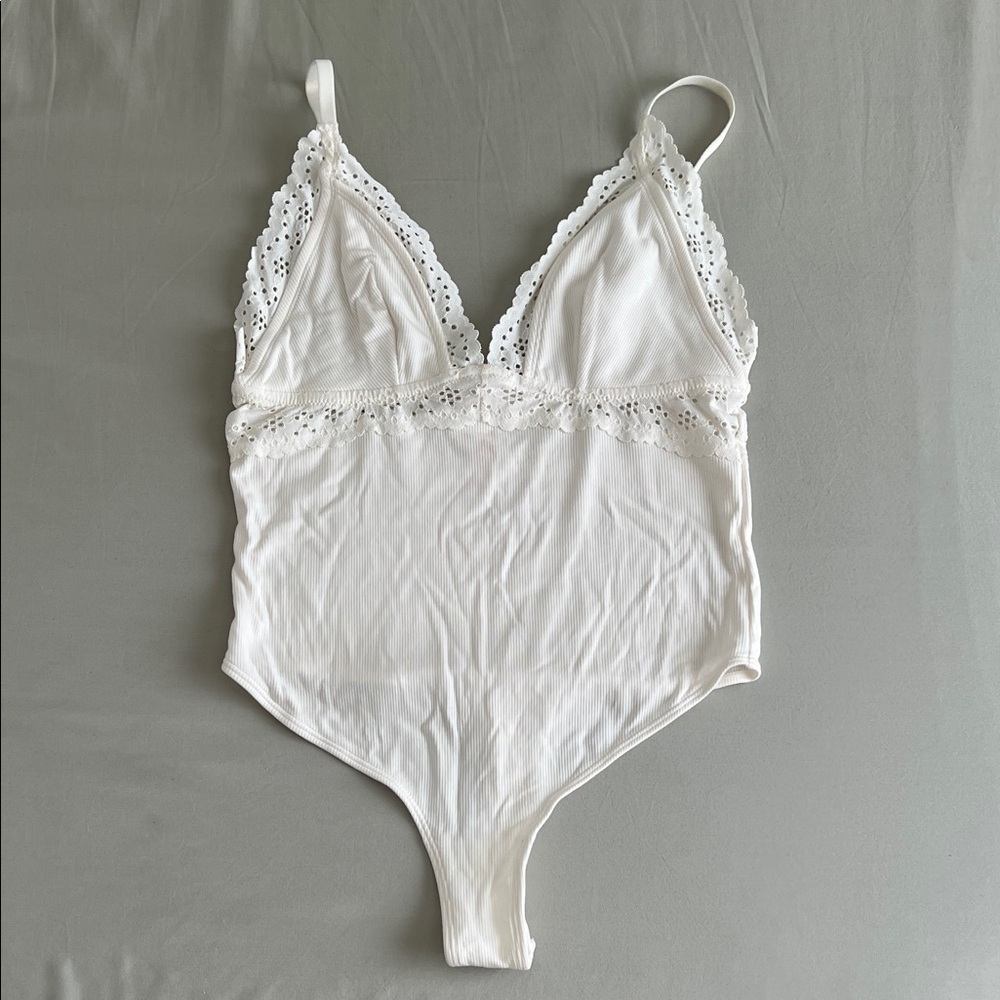 Colsie White Eyelet Trim Triangle Thong Bodysuit